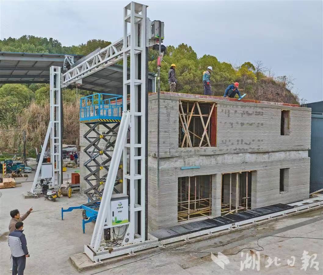 【湖北日报】美加墨世界杯官网“打印”出双层小楼-1027-媒体关注